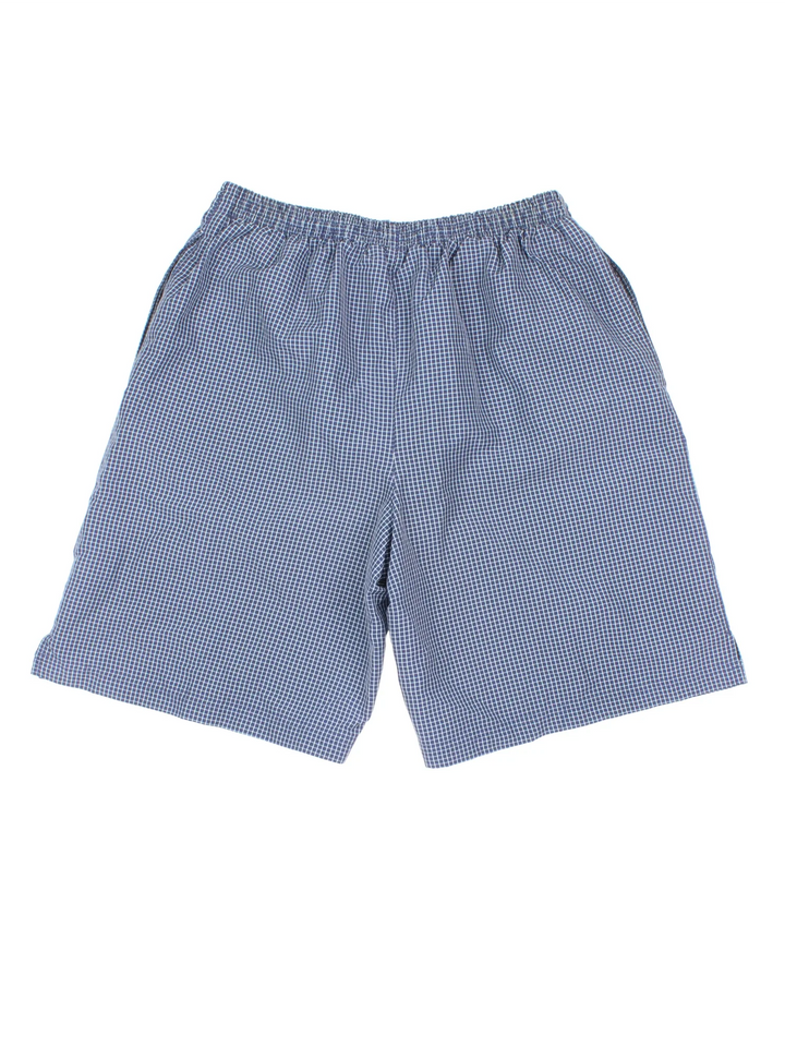Vintage Umbro Swim Shorts in blue colourway with drawstring waist, side pockets and the logo embroidered on the front.
