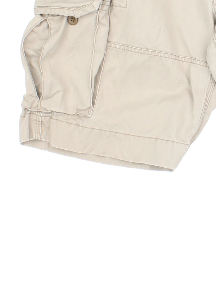 Vintage Ralph Lauren Shorts in tan colourway, with multiple pockets and the logo embroidered on the back.