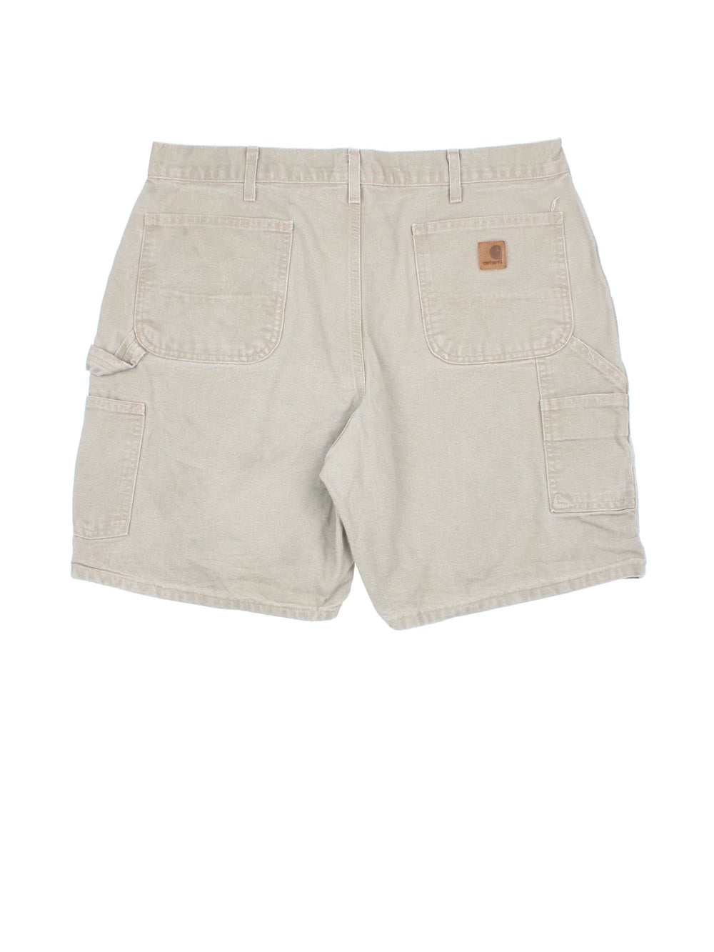 Vintage Carhartt Shorts in tan colourway. Zip/button fastening with multiple pockets and leather logo patch on back pocket.