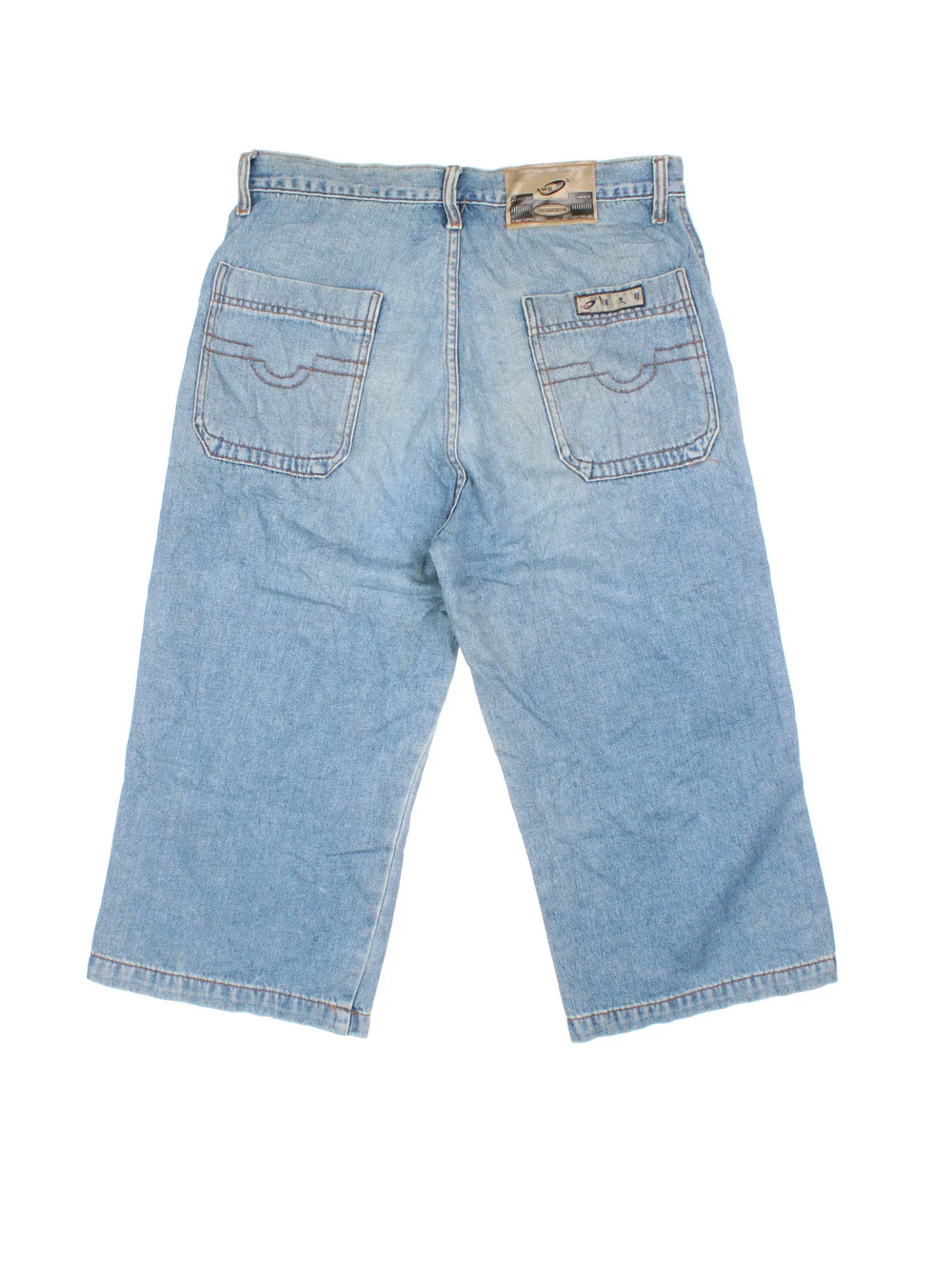 Vintage Y2K Denim Jorts in blue colourway. Zip fly fastening with multiple pockets, contrast stitching and branded tab on back.