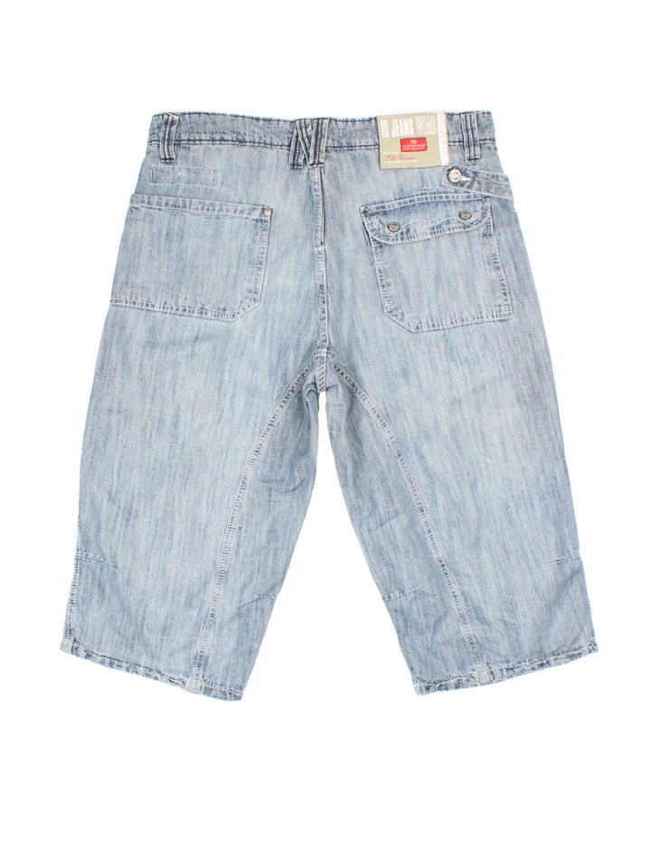 Vintage Y2K Denim Jorts in blue colourway. Zip fly fastening with multiple pockets, contrast stitching and branded tab on back.