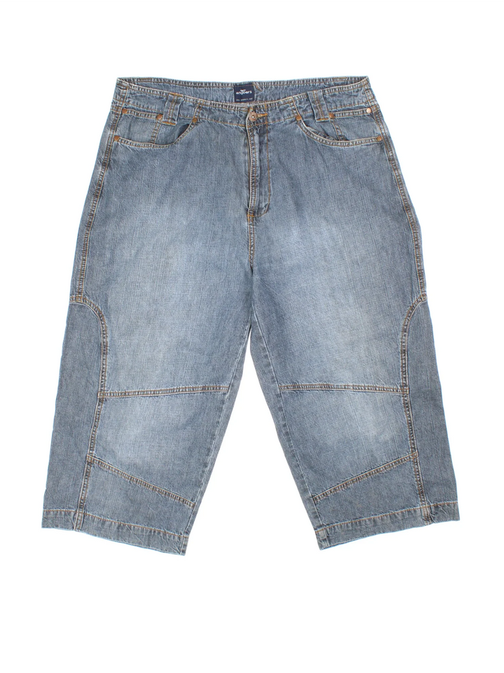 Vintage Y2K Denim Jorts in blue colourway. Zip fly fastening with multiple pockets and contrast stitching.