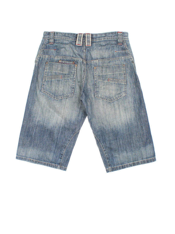 Vintage Y2K Denim Jorts in blue colourway. Zip fly fastening with multiple pockets and contrast stitching.
