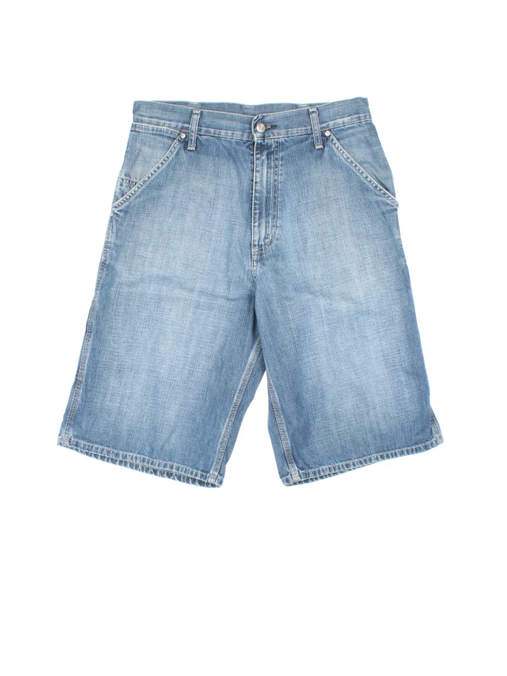 Vintage Carhartt Carpenter Shorts in blue colourway with multiple pockets and the logo embroidered on the back.
