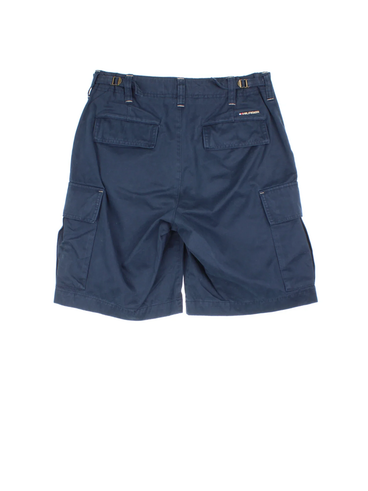 Vintage Tommy Hilfiger shorts in blue colourway with multiple pockets and the logo embroidered on the back.