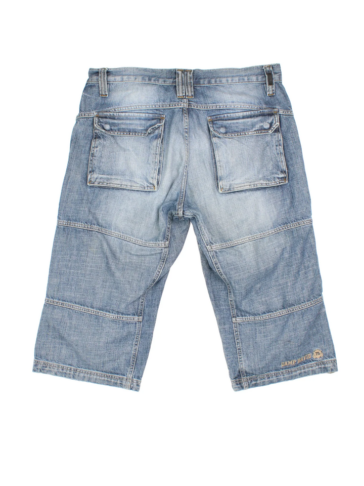 Y2K Denim Jorts shorts in blue colourway with zip button fly and  multiple pockets.
