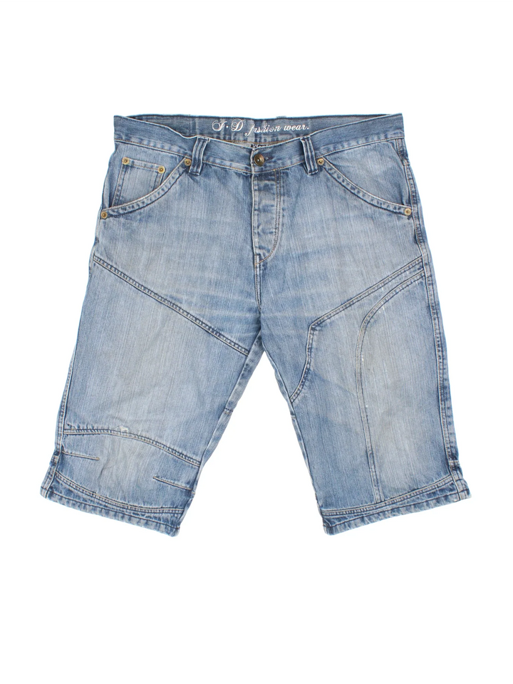 Vintage Y2K Denim Jorts in blue colourway with multiple pockets, contrast stitching and leather logo patch embroidered on the back.