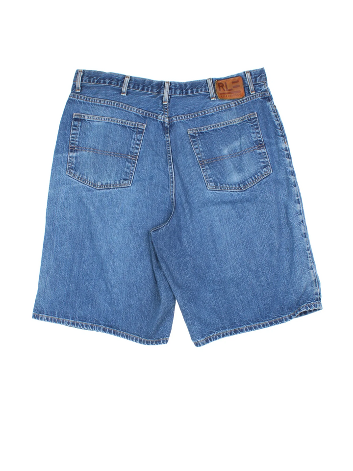 Ralph Lauren Denim Shorts in blue colourway with multiple pockets, contrast stitching and leather logo patch embroidered on the back.
