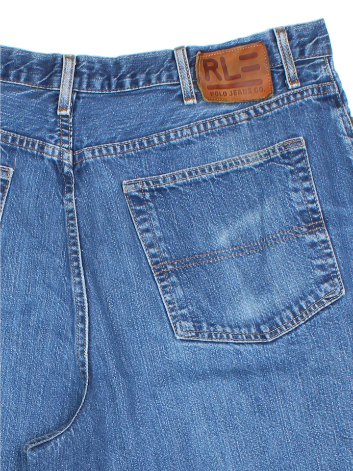 Ralph Lauren Denim Shorts in blue colourway with multiple pockets, contrast stitching and leather logo patch embroidered on the back.