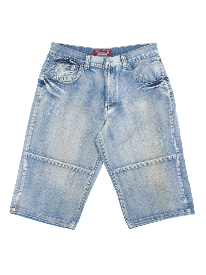 Vintage Y2K Denim Jorts in blue colourway with multiple pockets, contrast stitching and leather logo patch embroidered on the back.