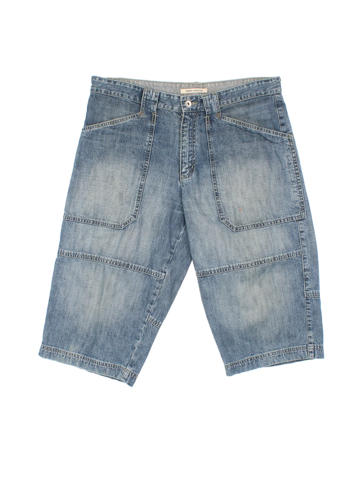 Vintage Y2K Denim Jorts in blue colourway with multiple pockets, contrast stitching and logo patch embroidered on the back.
