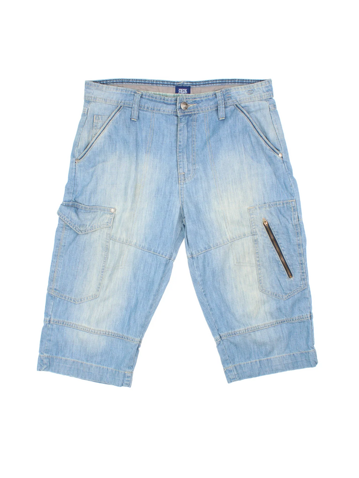 Y2K Denim Jorts in blue colourway with multiple pockets and contrast stitching.