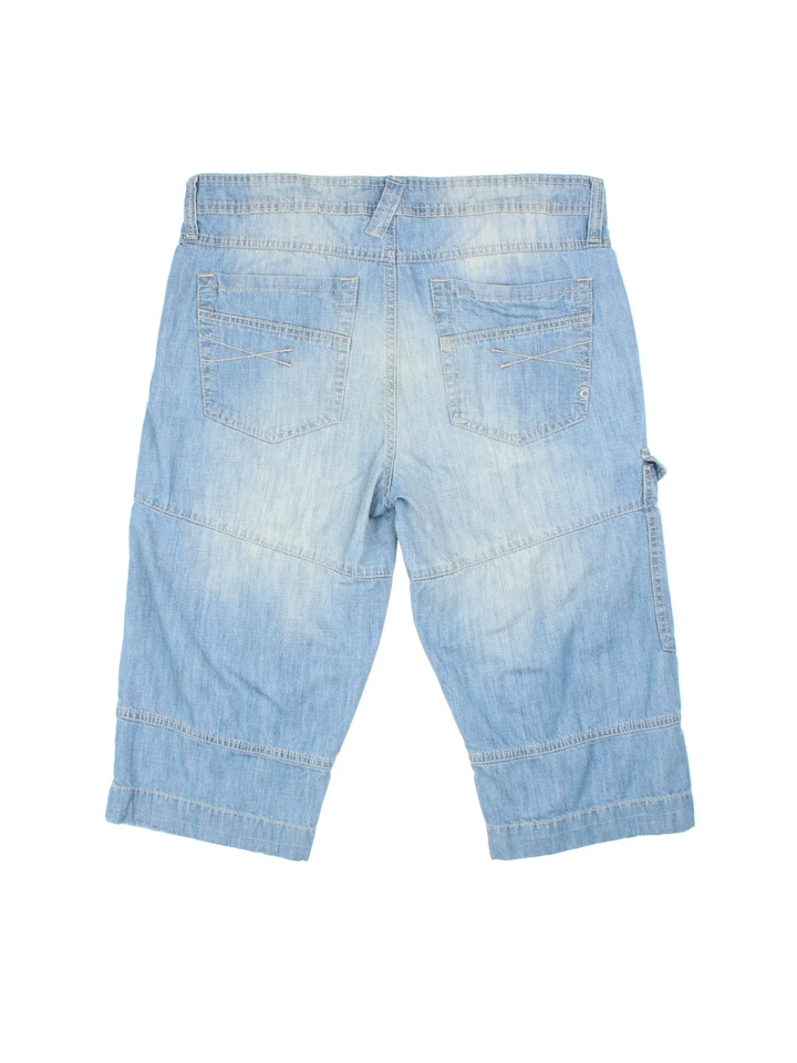 Y2K Denim Jorts in blue colourway with multiple pockets and contrast stitching.