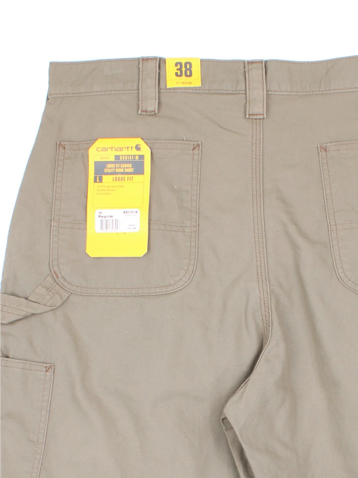 Vintage Carhartt Shorts in green colourway with multiple pockets and the logo embroidered on the back.