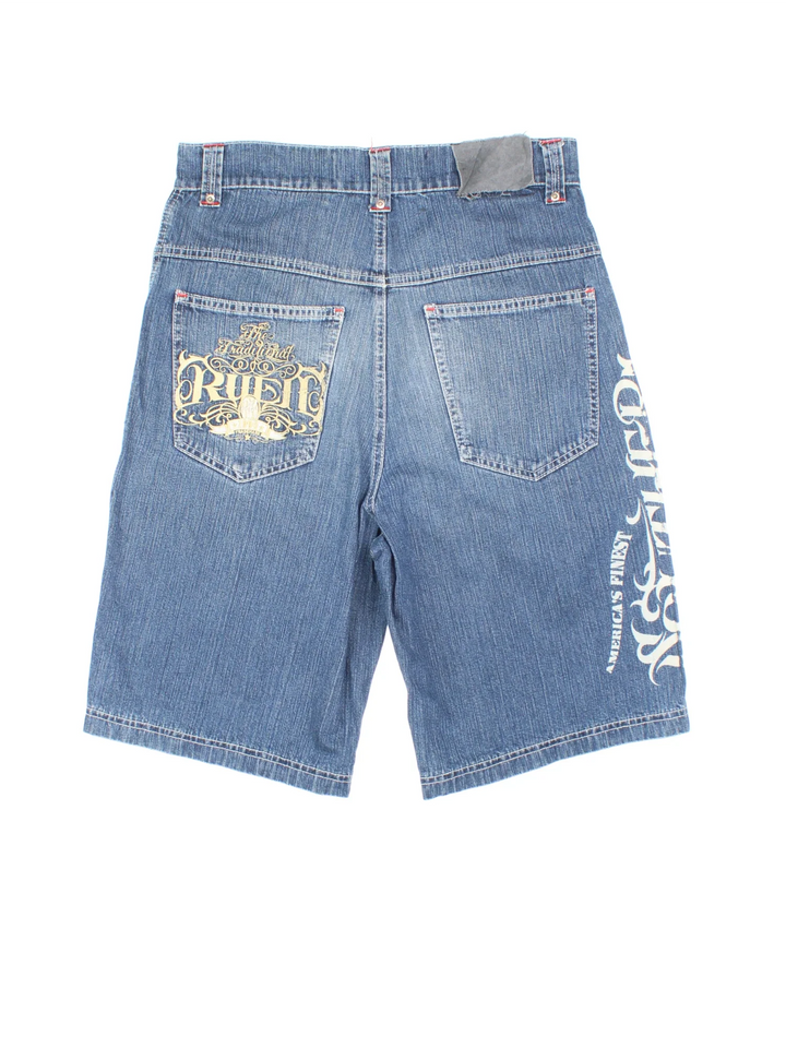 Y2K Jorts in blue colourway with multiple pockets, printed detail down the leg and the logo embroidered on the back.