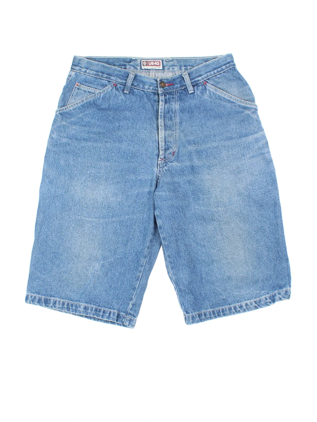 Y2K Denim Jorts in blue colourway with multiple pockets and the logo embroidered on the back.