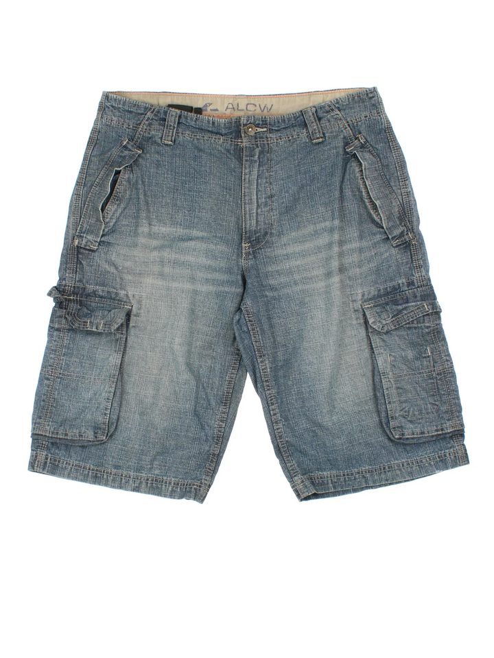 Y2K Denim Cargo Shorts in blue colourway with multiple pockets and the logo embroidered on the back.