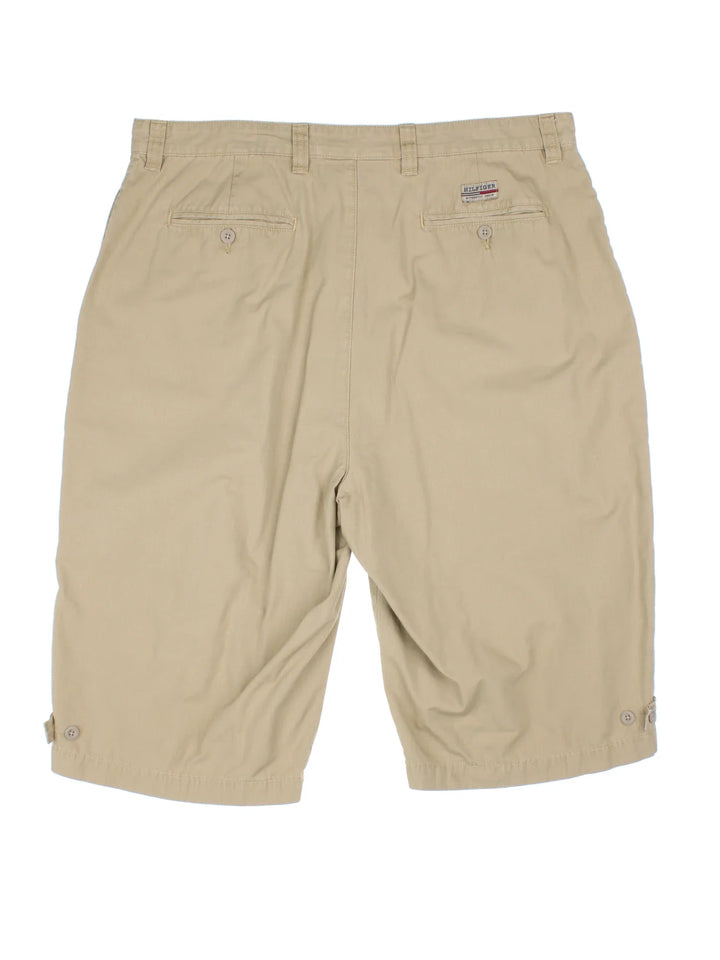 Tommy Hilfiger Cargo Shorts in tan colourway with multiple pockets and embroidered branding detail on back.