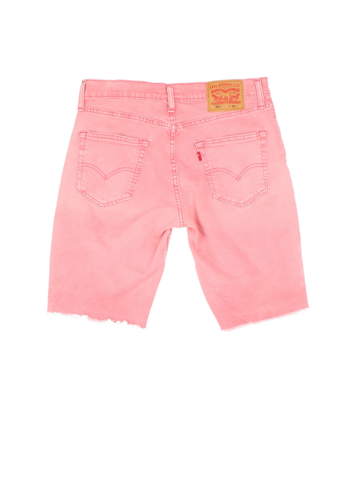 Vintage Levi Strauss Denim Shorts in pink colourway with multiple pockets and the logo embroidered on the back.