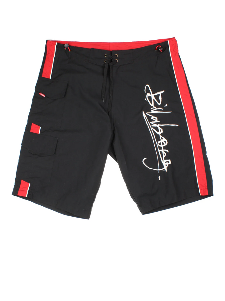 Vintage Billabong Board shorts in black/red colourway with lace up fastening and the logo embroidered on the front.