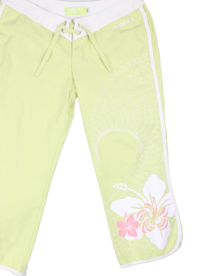 Y2K O'neill Capri Pants in green colourway. and the logo printed on the front/back.