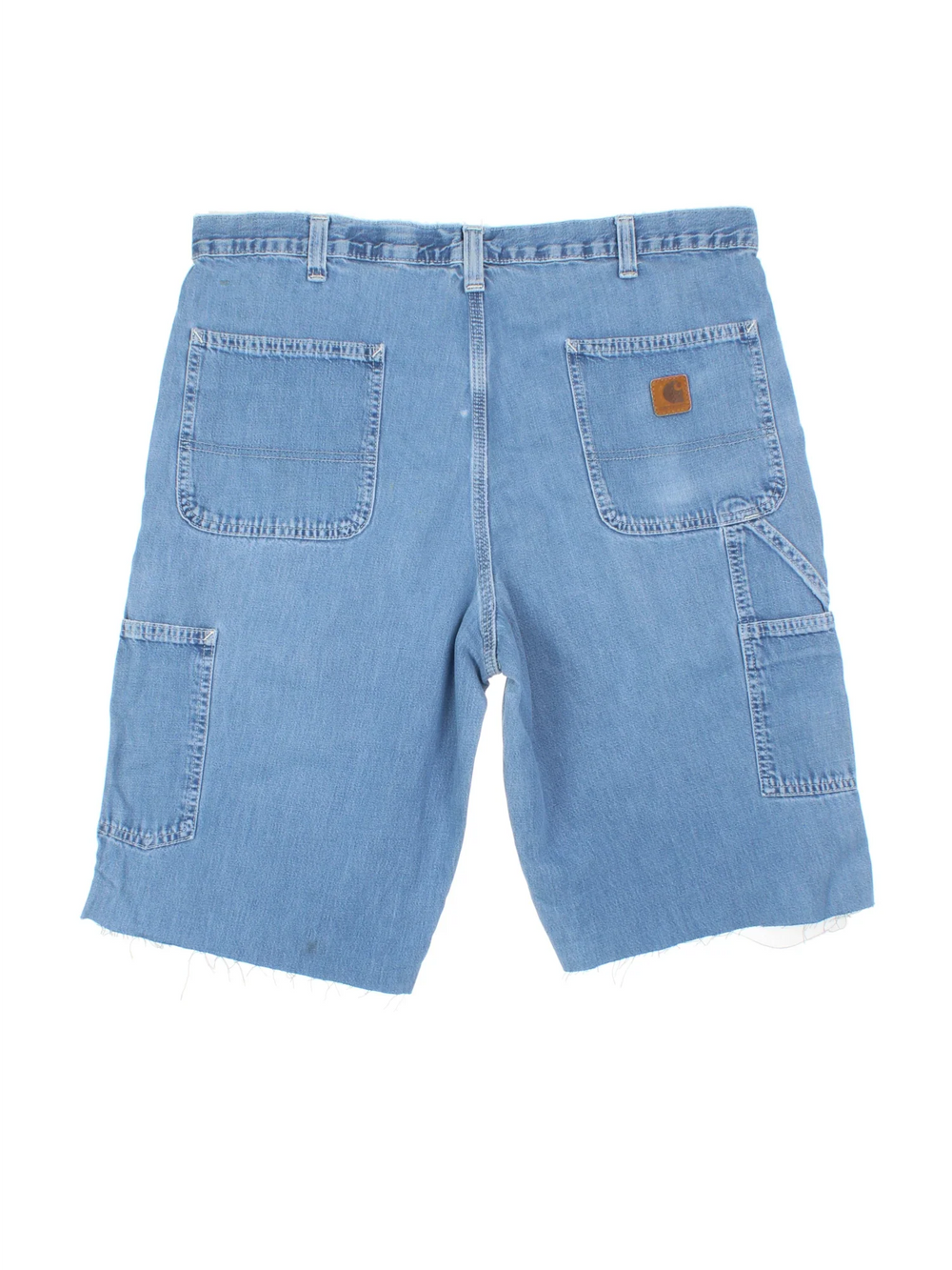 Carhartt Cut Off Shorts in blue colourway. Zip fly fastening with multiple pockets, frayed hem and embroidered branding on the back.