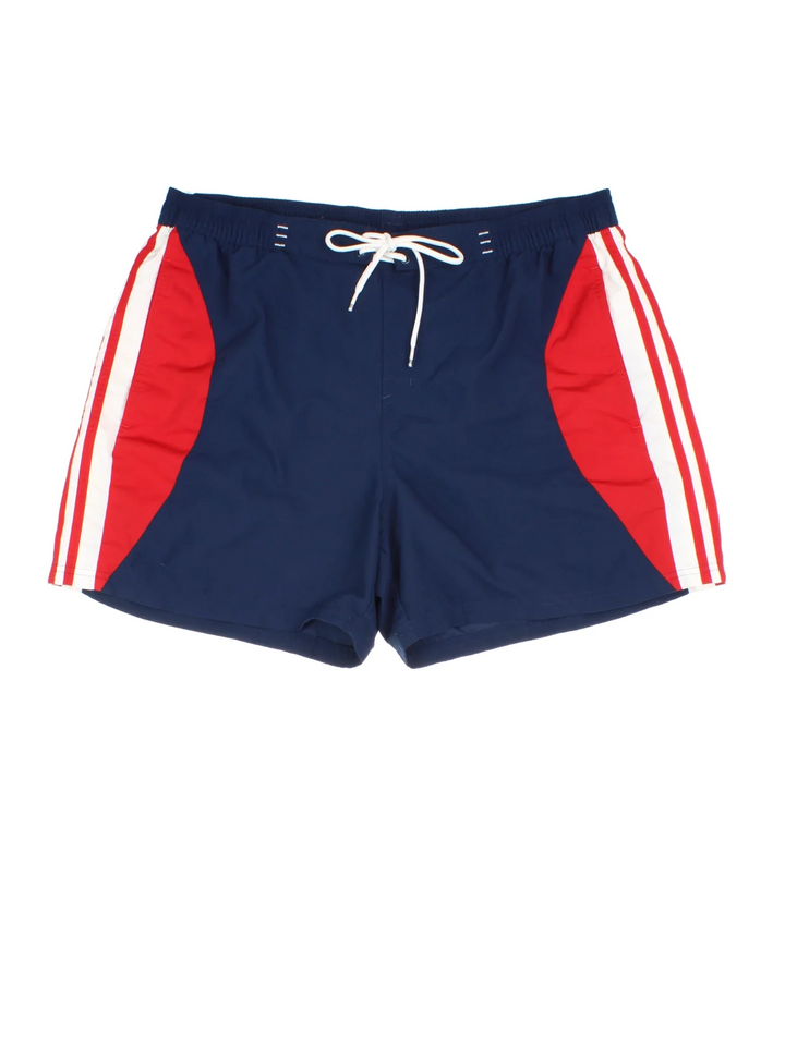 Adidas Swim Shorts in blue, red and white colourway with pockets, elasticated waist with drawstring, mesh lining and the logo printed on the back.