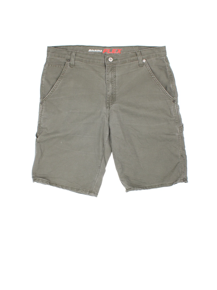 Vintage Dickies shorts in green colourway with multiple pockets and the logo embroidered on the back.
