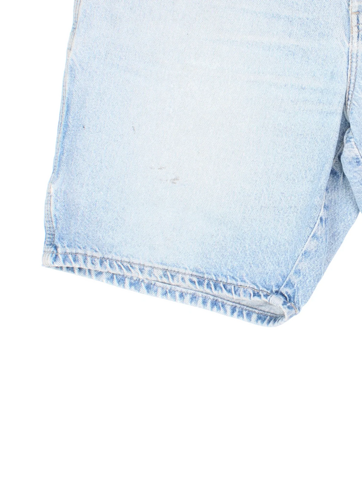 Vintage Dickies Denim Shorts in blue colourway with multiple pockets and the logo embroidered on the back.