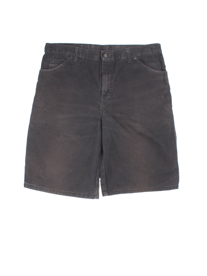 Vintage Dickies shorts in black colourway with multiple pockets and the logo embroidered on the front.
