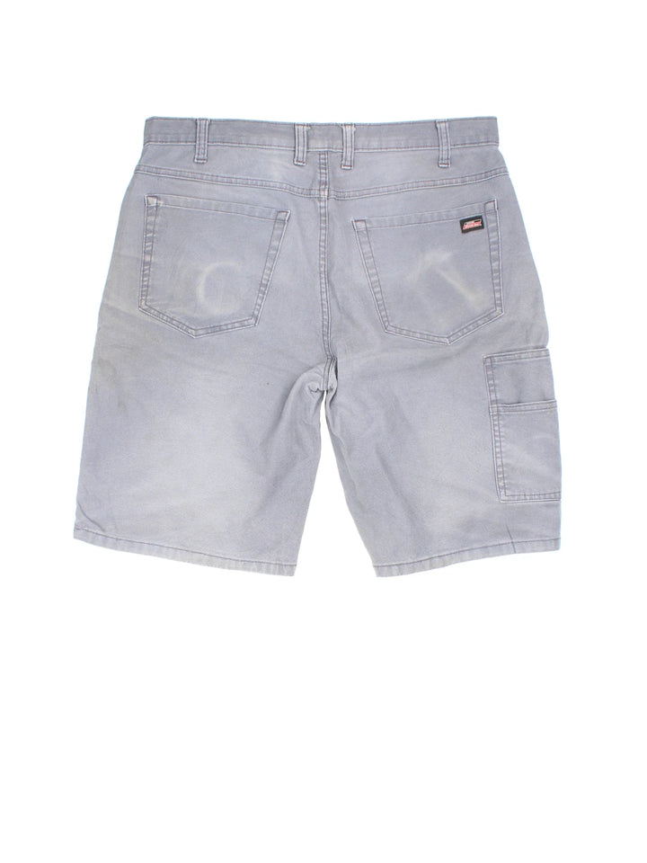 Vintage Dickies shorts in grey colourway with multiple pockets and the logo embroidered on the front.
