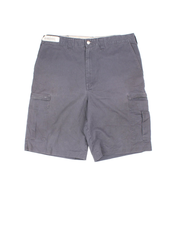 Vintage Dickies shorts in grey colourway with multiple pockets and the logo embroidered on the back.