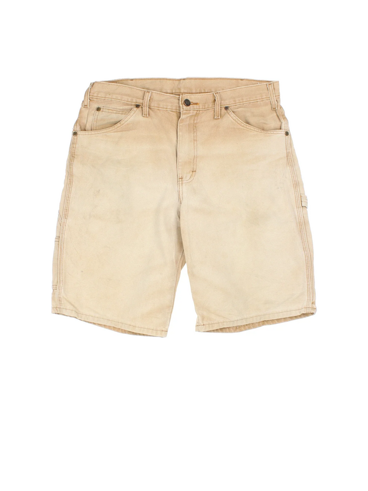 Vintage Dickies shorts in tan colourway with multiple pockets and the logo embroidered on the back.