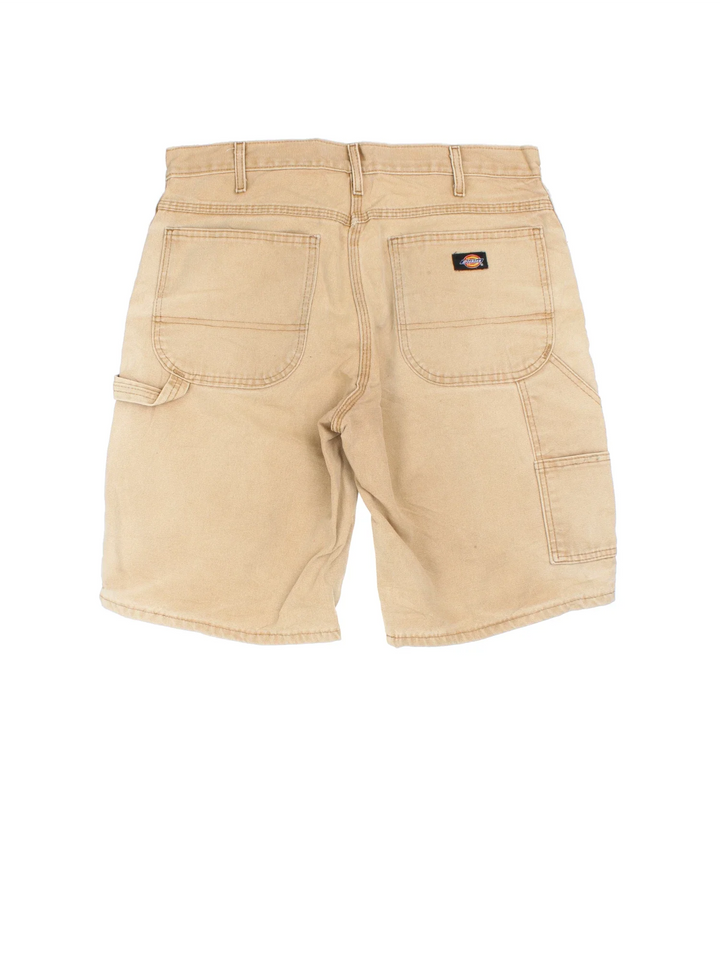 Vintage Dickies shorts in tan colourway with multiple pockets and the logo embroidered on the back.