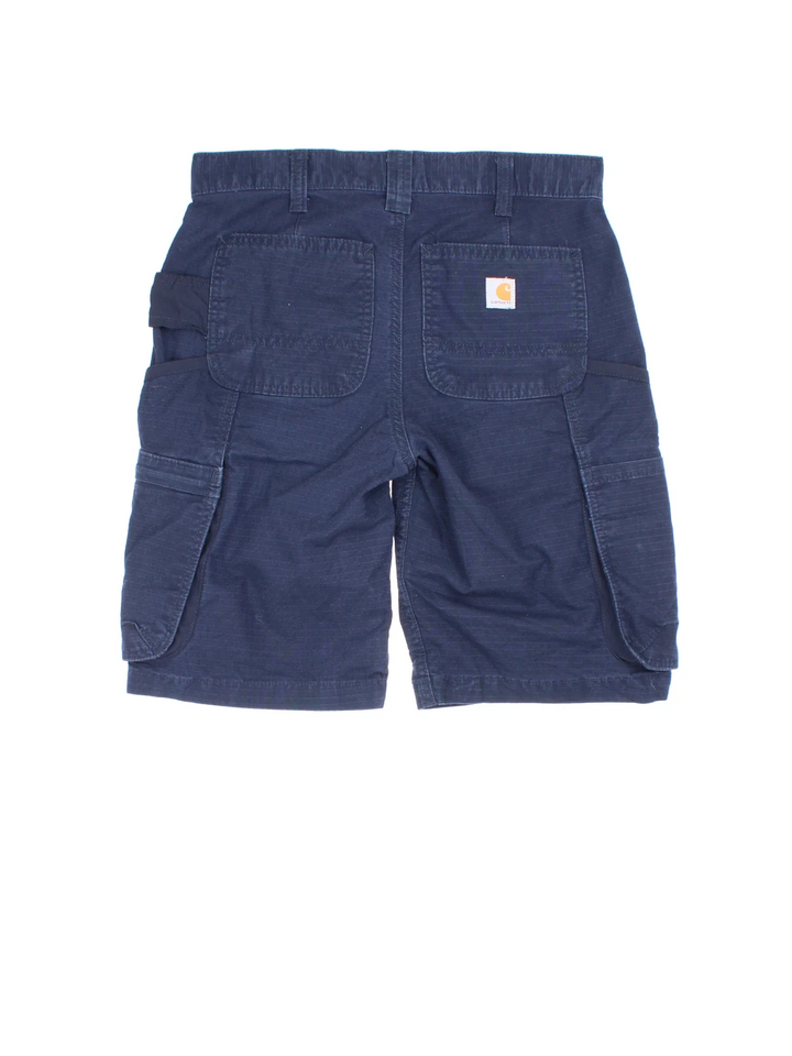 Vintage Carhartt Cargo shorts in blue colourway with multiple pockets and the logo embroidered on the back.