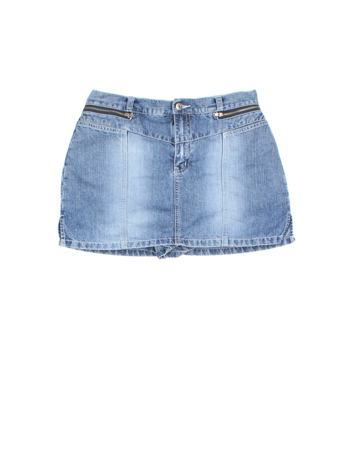Y2K Denim Skort in blue colourway. Front zip/button fastening, with multiple pockets and built in shorts underneath.