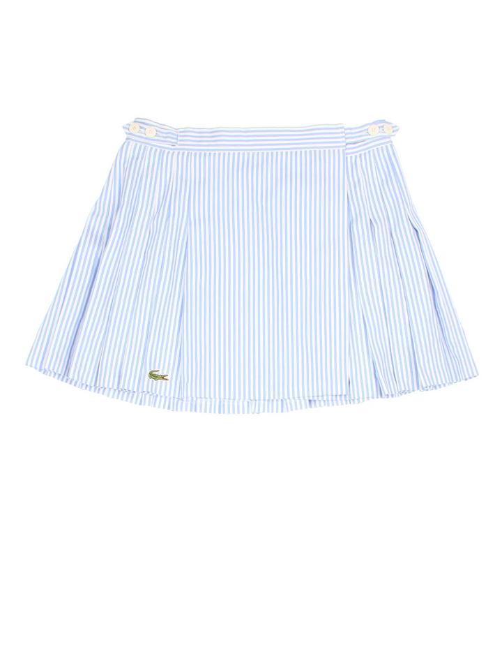 Lacoste Tennis Skirt in blue/white striped colourway. Cross over button fastening, full circle pleated skirt with embroidered branding on the front.
