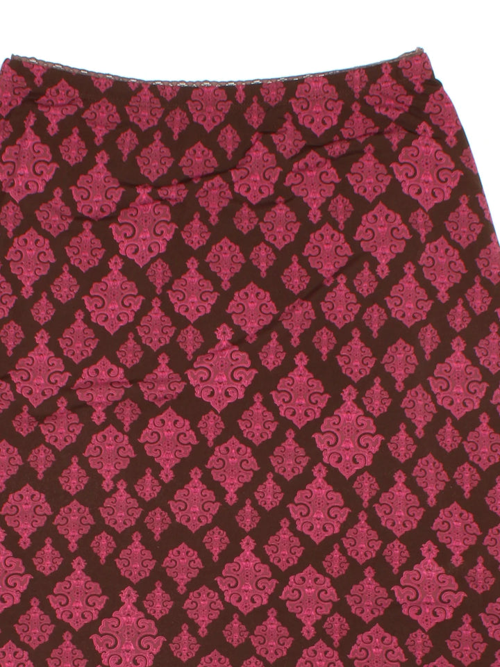 Y2K Paisley Asymmetrical Skirt in pink/brown colourway with all over print, double layer and asymmetrical
 hem detail.
