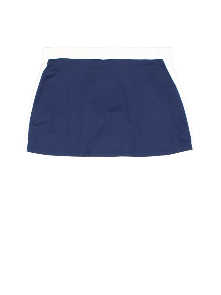Adidas Sports Skort in blue/white colourway with built in shorts and branding printed on the front.