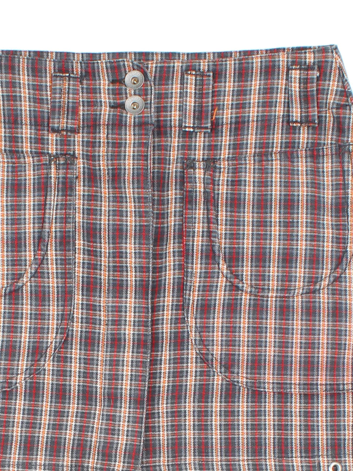 Y2K Pepe Mini Skirt in brown plaid pattern colourway with zip button fastening, multiple pockets and branding embroidered on the back.