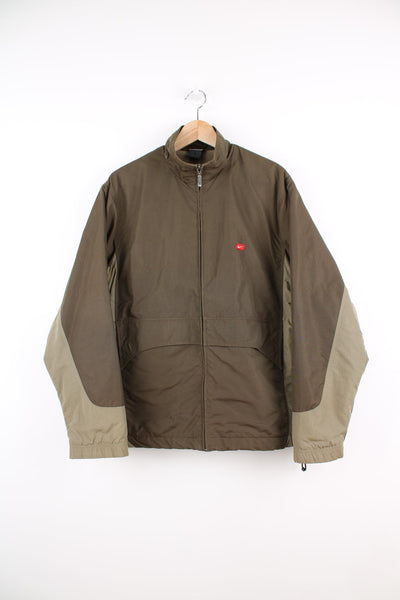 Vintage Nike zip through jacket with fleece lining in khaki. Features embroidered logo on the chest.