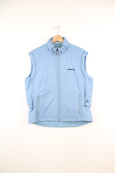 Vintage Adidas gilet featuring embroidered logo on the chest.