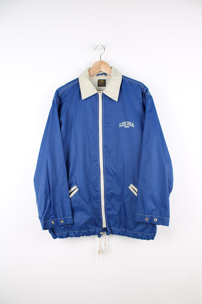 Lee blue track jacket featuring printed logo on the chest and across the back.
