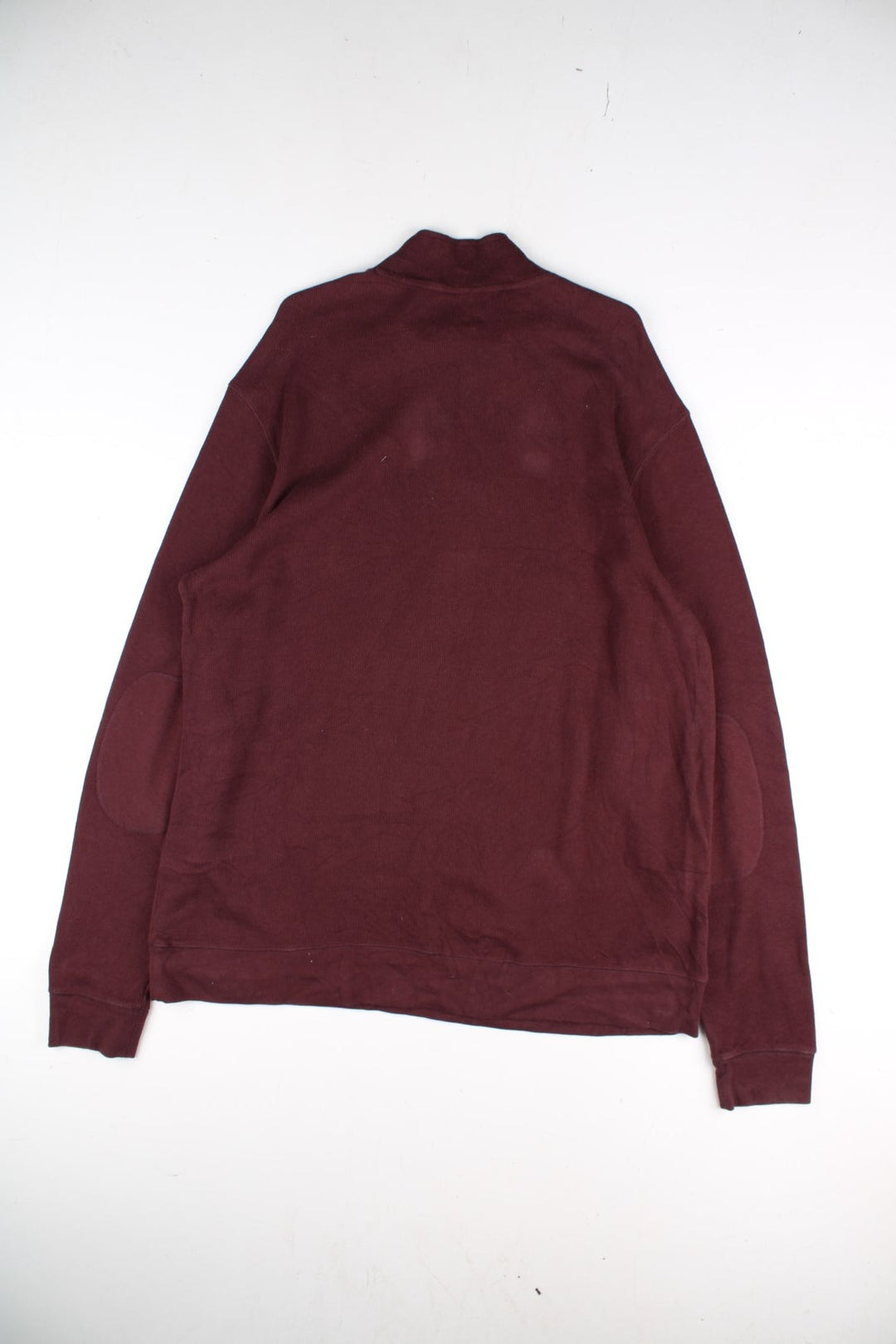 Carhartt 1/4 Zip Sweatshirt in a red colourway with small logo on the hem.