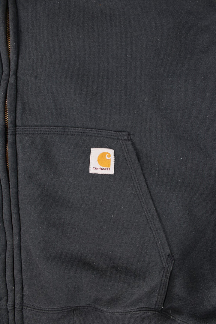 Carhartt Hoodie in a blue colourway with camo print lining. Large pocket and small classic logo on the front. 