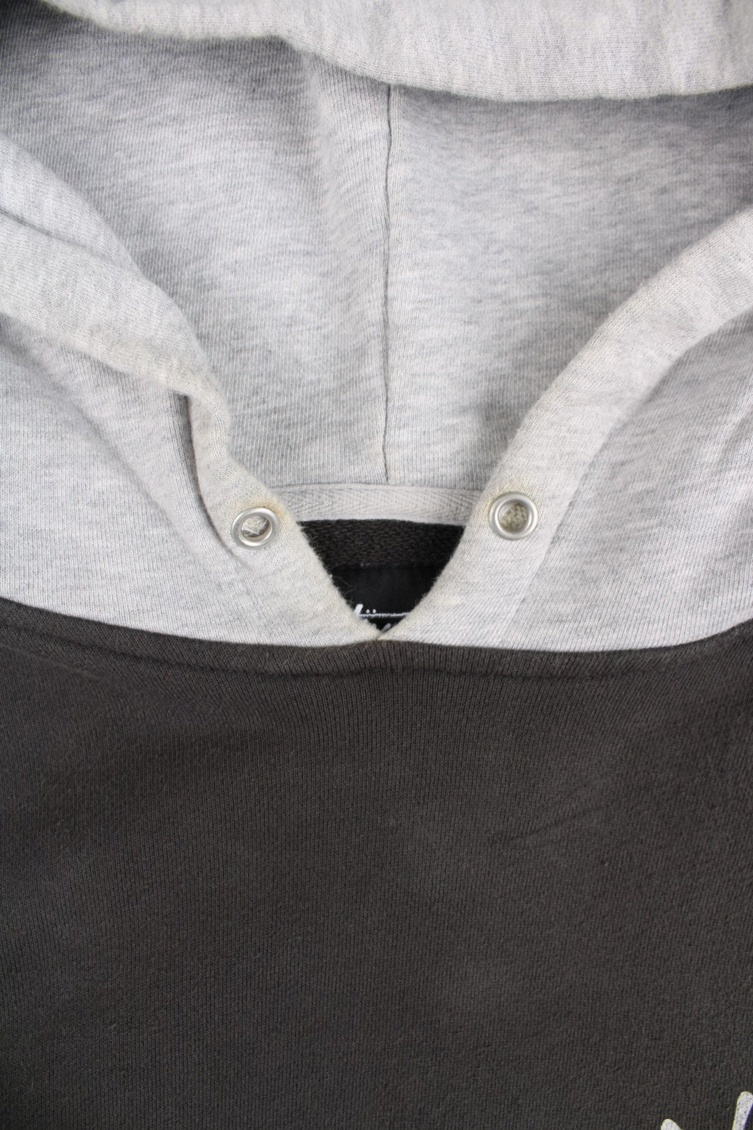 Stussy Two Tone Sweatshirt in a grey colourway with pocket and small logo on the front. Large Stussy logo on the back.