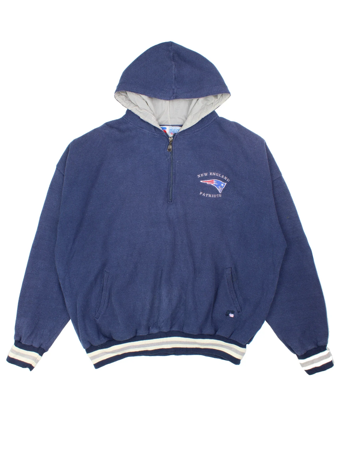 Vintage New England Patriots NFL Russell Athletic Hoodie in a blue colourway, 1/4 zip up with the logo embroidered on the front.