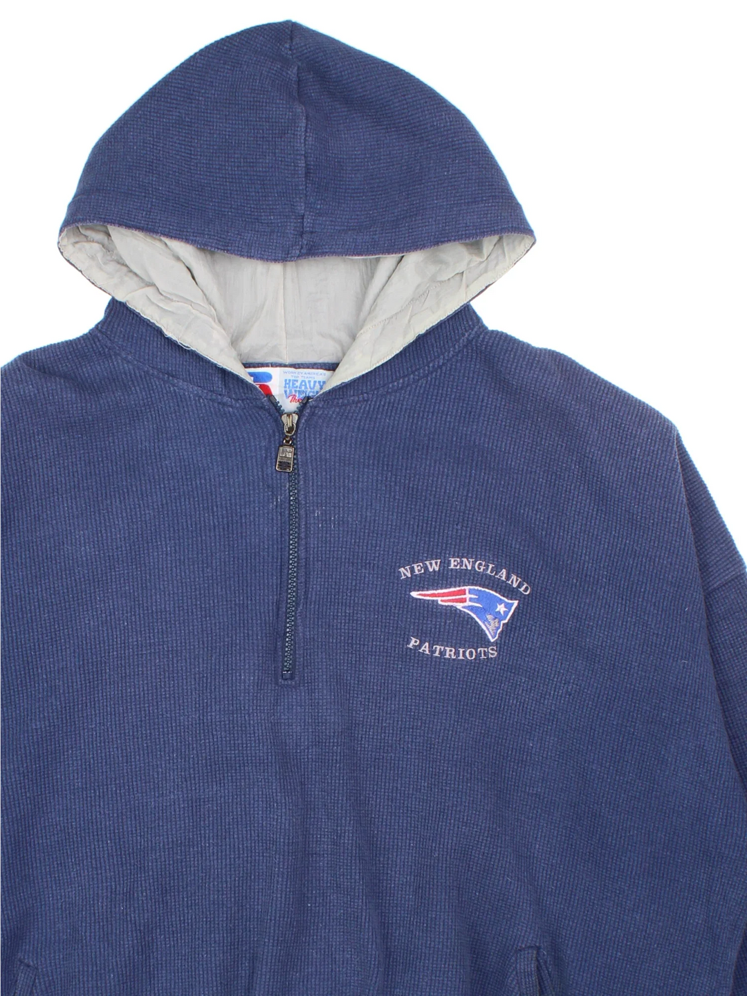 Vintage New England Patriots NFL Russell Athletic Hoodie in a blue colourway, 1/4 zip up with the logo embroidered on the front.