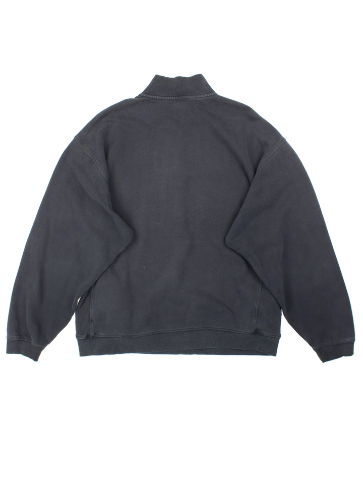 Vintage Nike 1/4 Zip Sweatshirt in a black colourway with the swoosh logo embroidered on the front.
