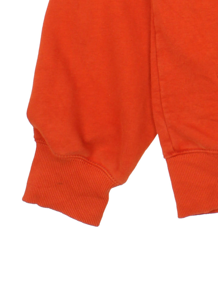 Carhartt Hoodie in a orange colourway with the logo embroidered on the front.
